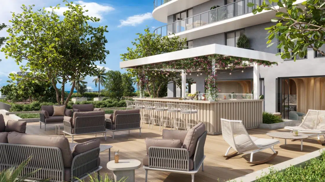 Terraza con bar y asientos modernos