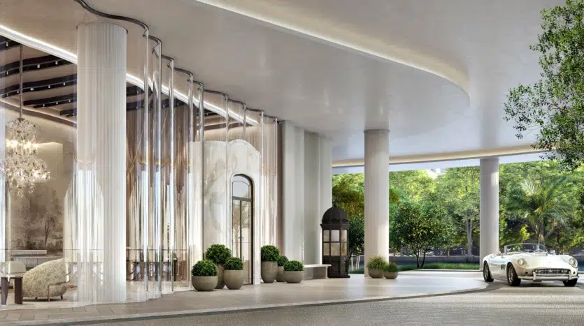 Entrada al edificio con zona para autos