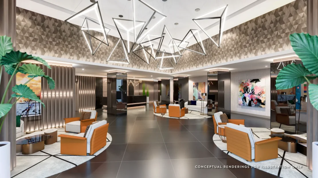 Interior de Circ Residences con muebles, cuadros modernos e iluminación blanca