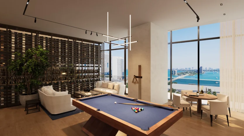 Salón de billar con decoración moderna y vista al mar