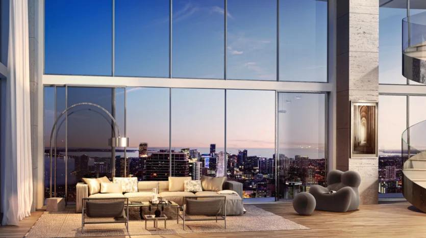 Sala de estar con muebles modernos y balcón con vistas al mar