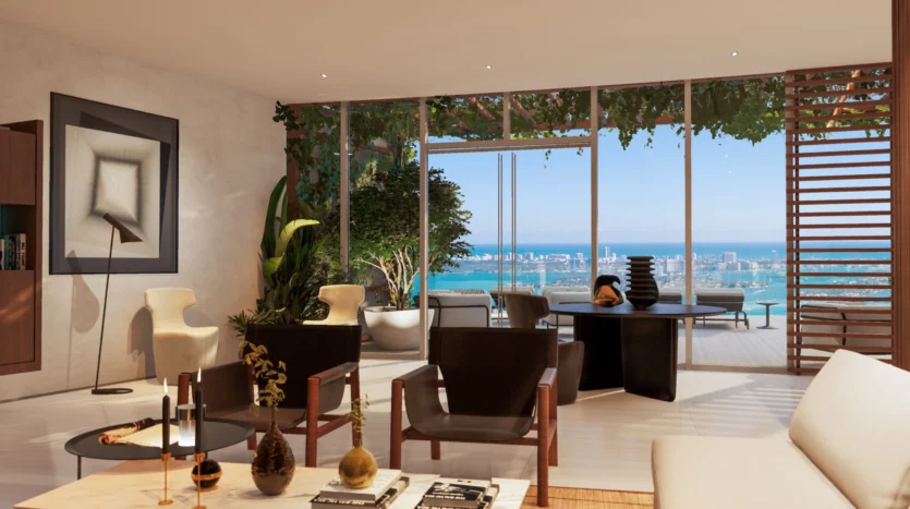 Sala de estar con muebles modernos y balcón con vistas al mar