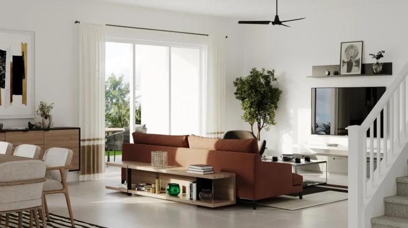 Sala de estar moderna con un sofá junto al comedor