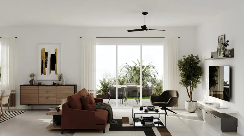 Sala de estar moderna con un sofá junto al comedor Crescent ridge