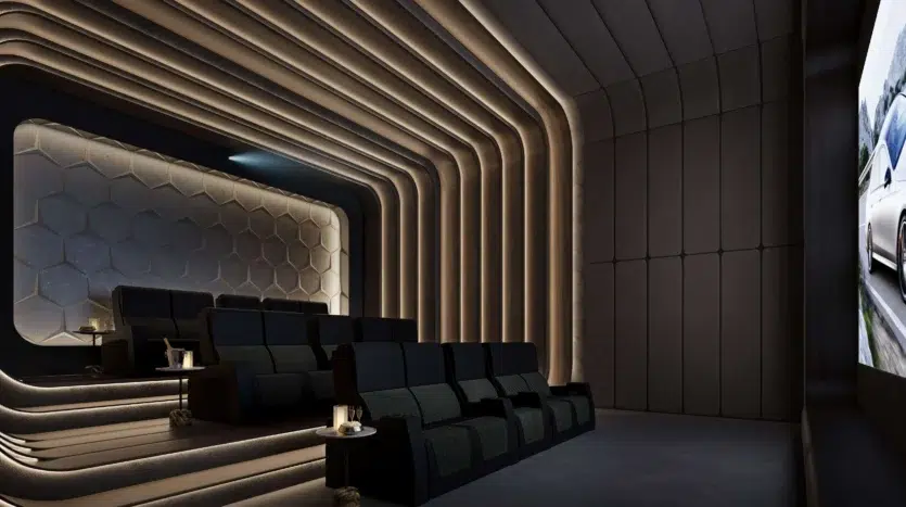 Cine exclusivo con luces dorada y gran pantalla