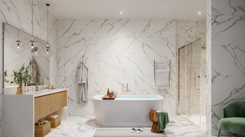 Baño de lujo con bañera, ducha y dos lavamanos