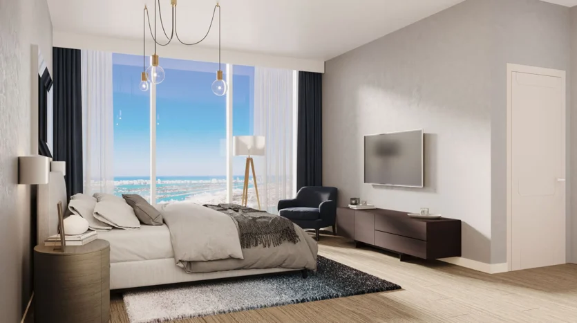 Dormitorio de una cama con vistas a la ciudad