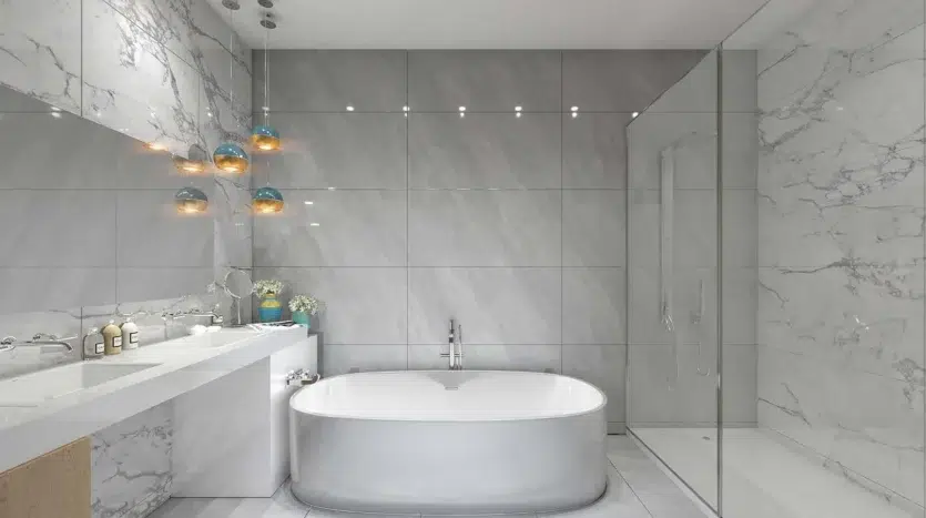 Baño moderno con espacio para ducha, bañera y dos lavamanos
