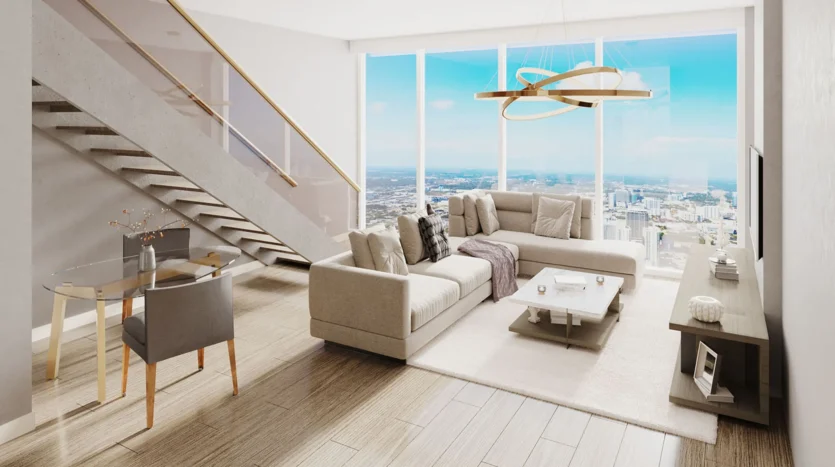 Sala con muebles de lujo, televisor y vistas a la ciudad