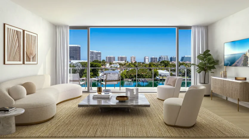 Sala de condo con muebles modernos y balcón con vistas a la alberca