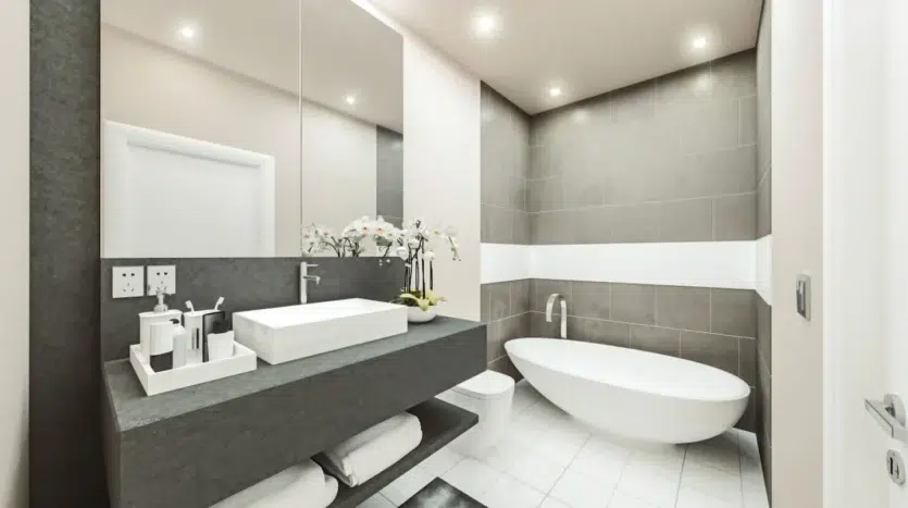 Baño moderno con un lavamanos y bañera