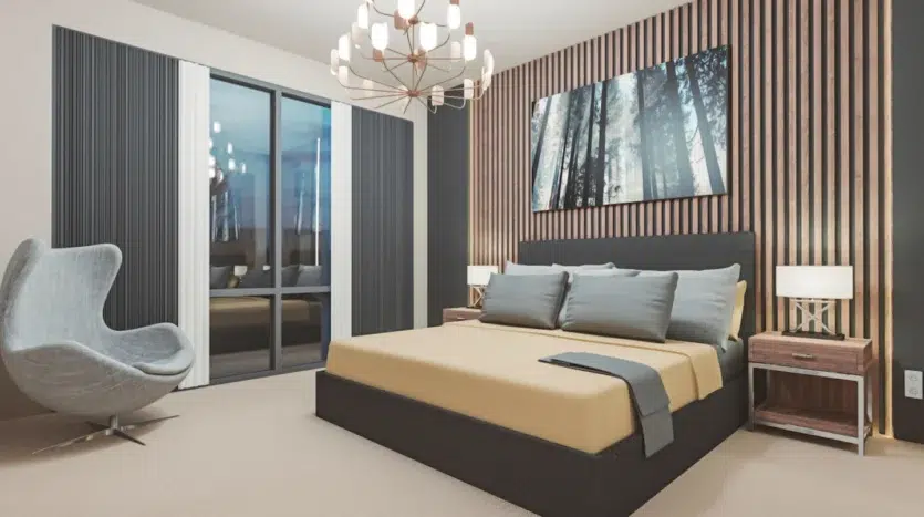 Dormitorio de una cama y cuadro en la pared